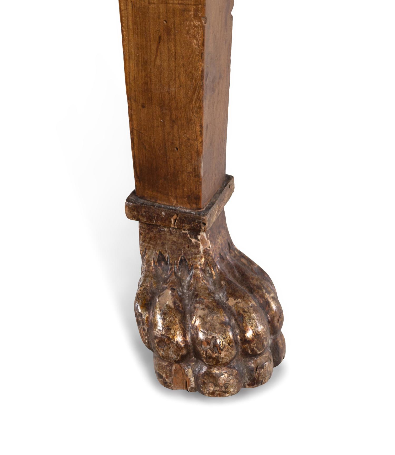 An Italian Carved Walnut Marble-Top Console Table