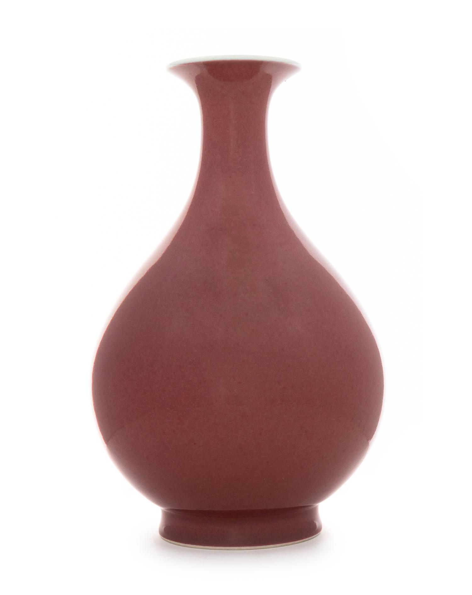 A Peach-Bloom Glazed Porcelain Vase, Yuhuchun ping Height 12 1/8 inches.