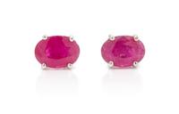 A Pair of White Gold and Ruby Stud Earrings, 0.80 dwts.