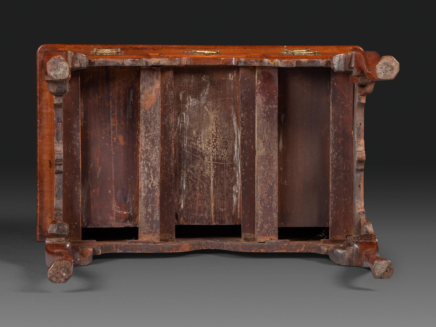 A Queen Anne Carved and Figured Walnut Dressing Table