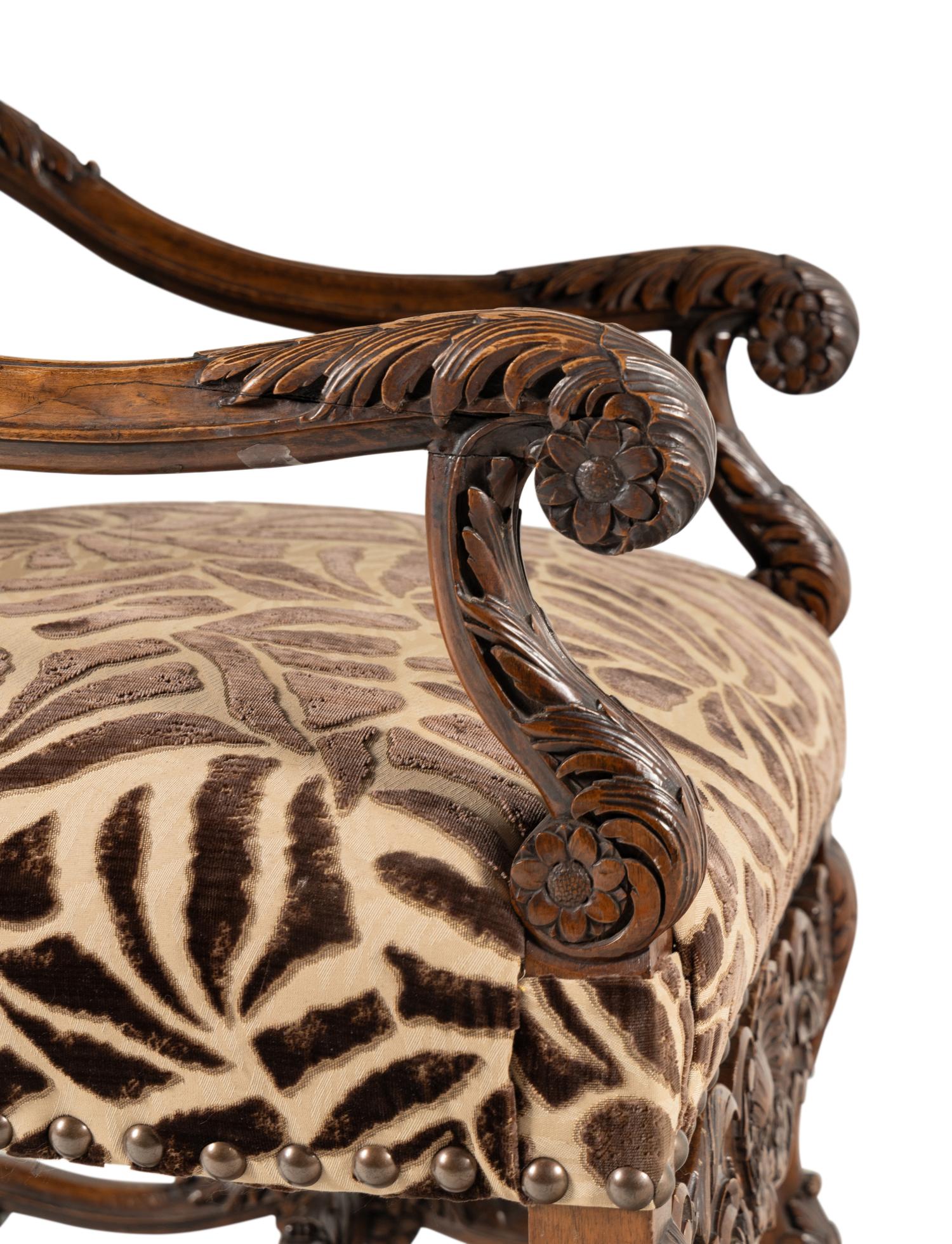 An Italian Rococo Revival Walnut Armchair