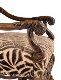 An Italian Rococo Revival Walnut Armchair