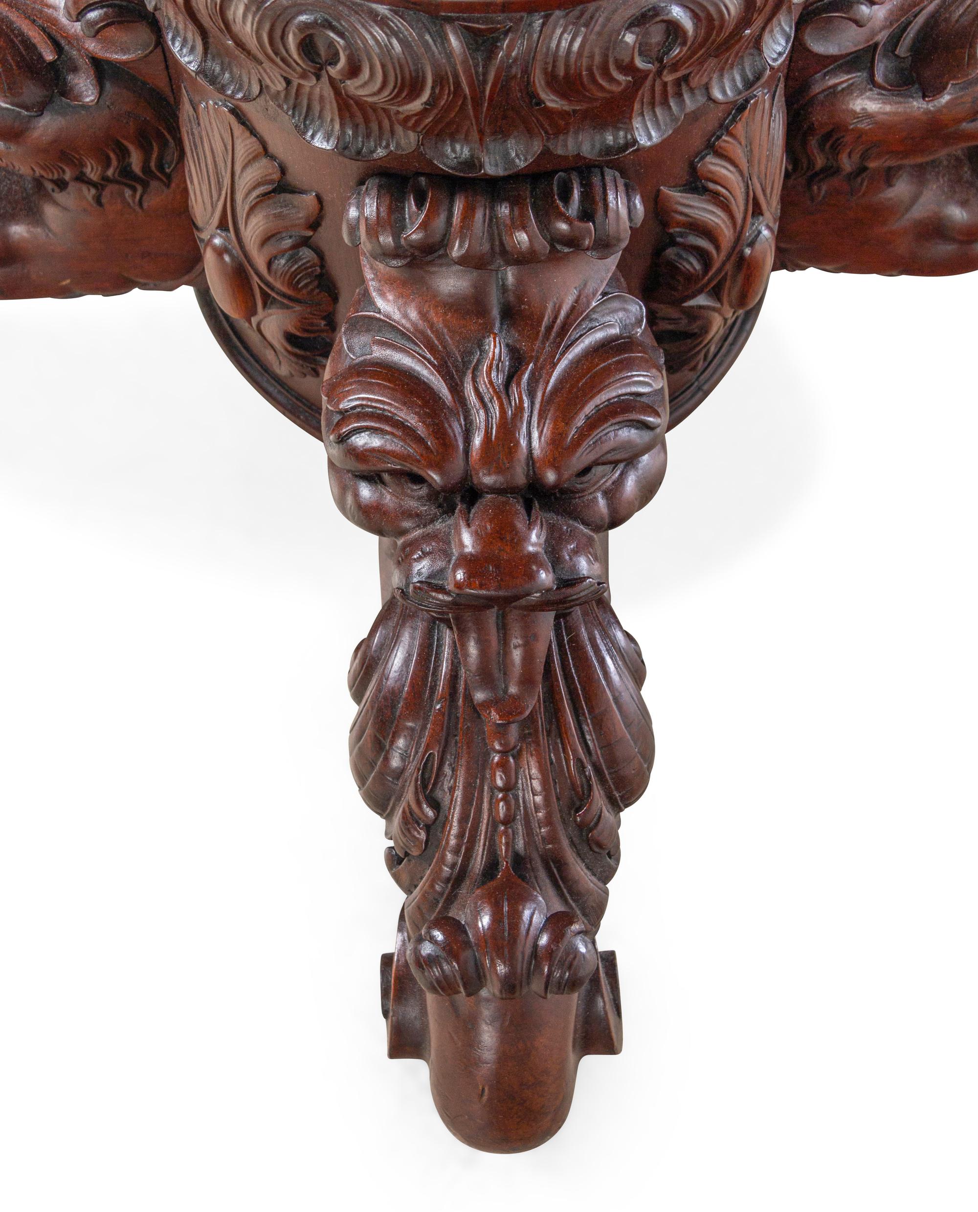 A Renaissance Revival Mask and Acanthus Carved Mahogany Pedestal Table
