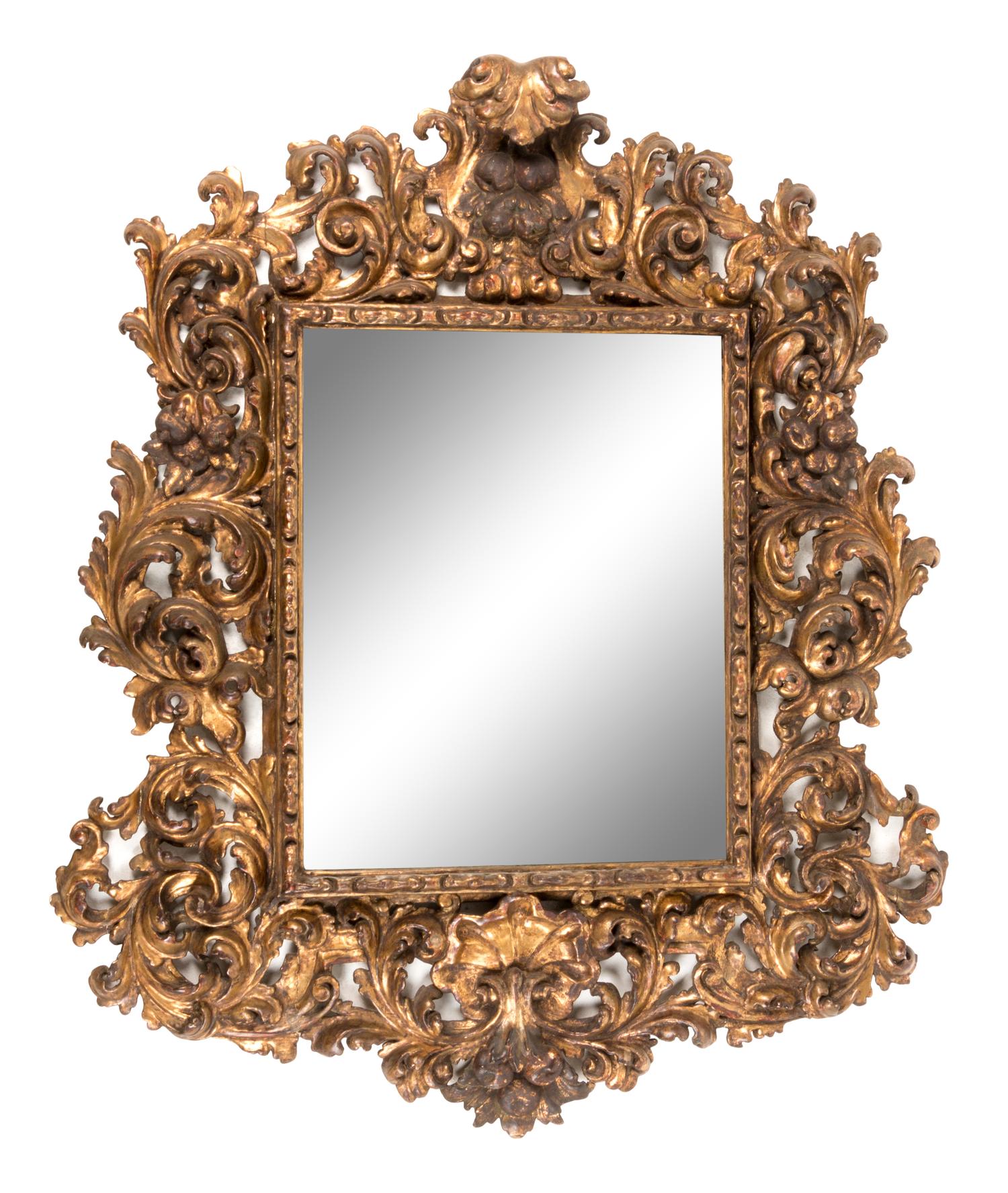 A Florentine Rococo Revival Carved Giltwood Overmantel Mirror