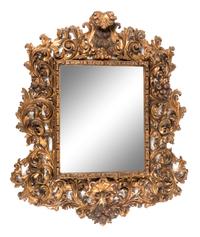 A Florentine Rococo Revival Carved Giltwood Overmantel Mirror