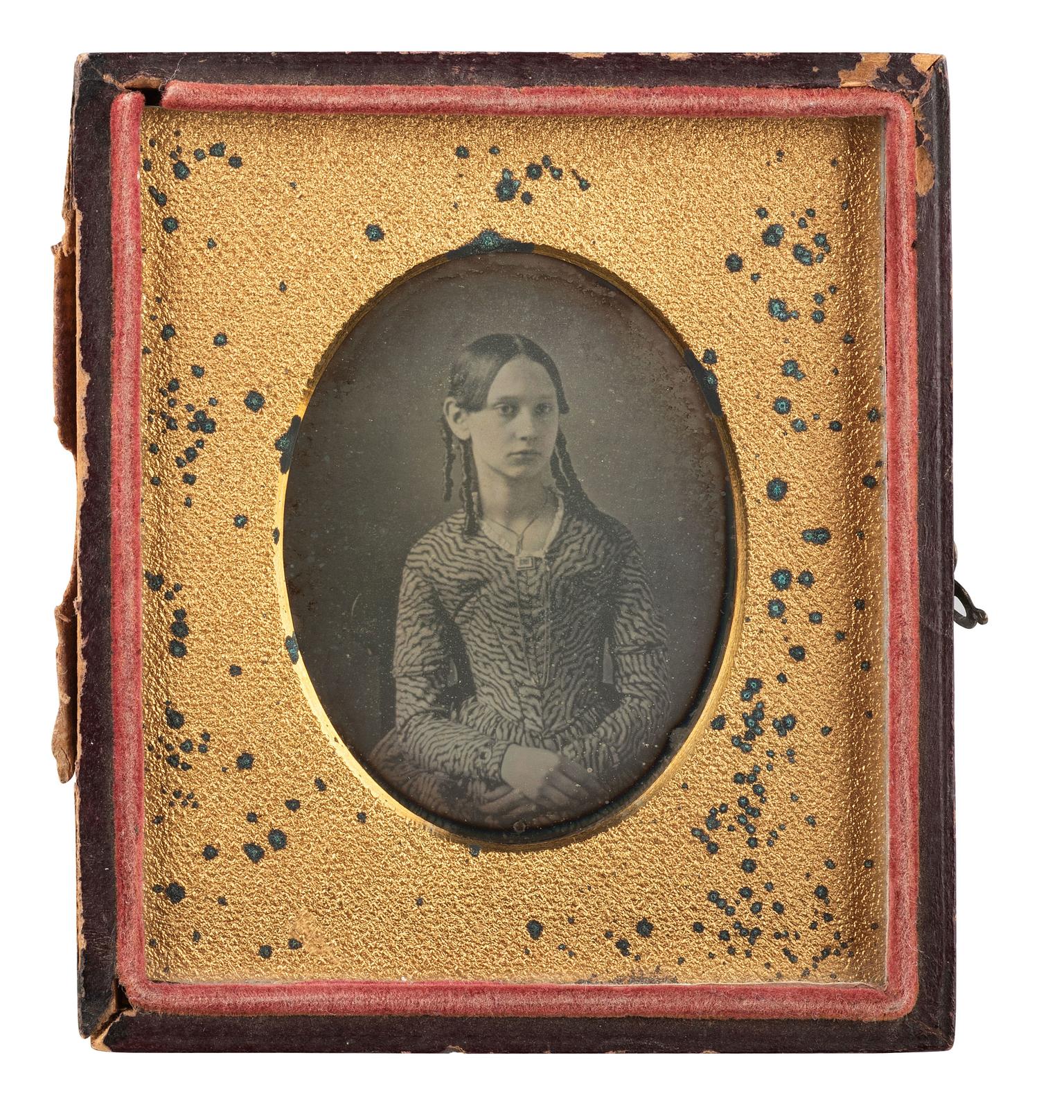 [EARLY PHOTOGRAPHY]. Sixth plate daguerreotype of a young woman. Ca 1840s.