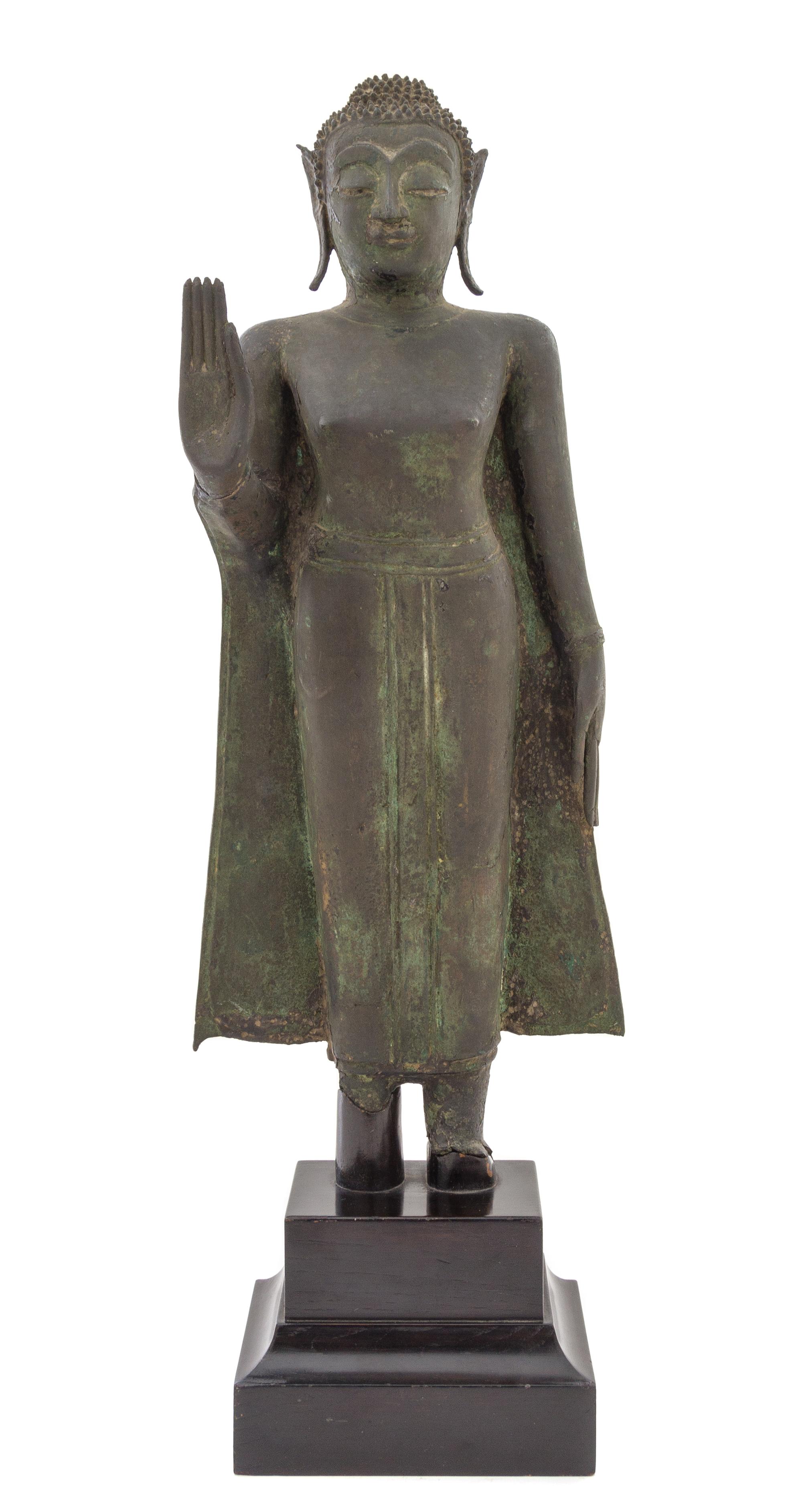 A Thai Bronze Figure of a Standing Buddha 18TH CENTURY Height of figure 21 1/4 inches. — 18TH CENTURY
