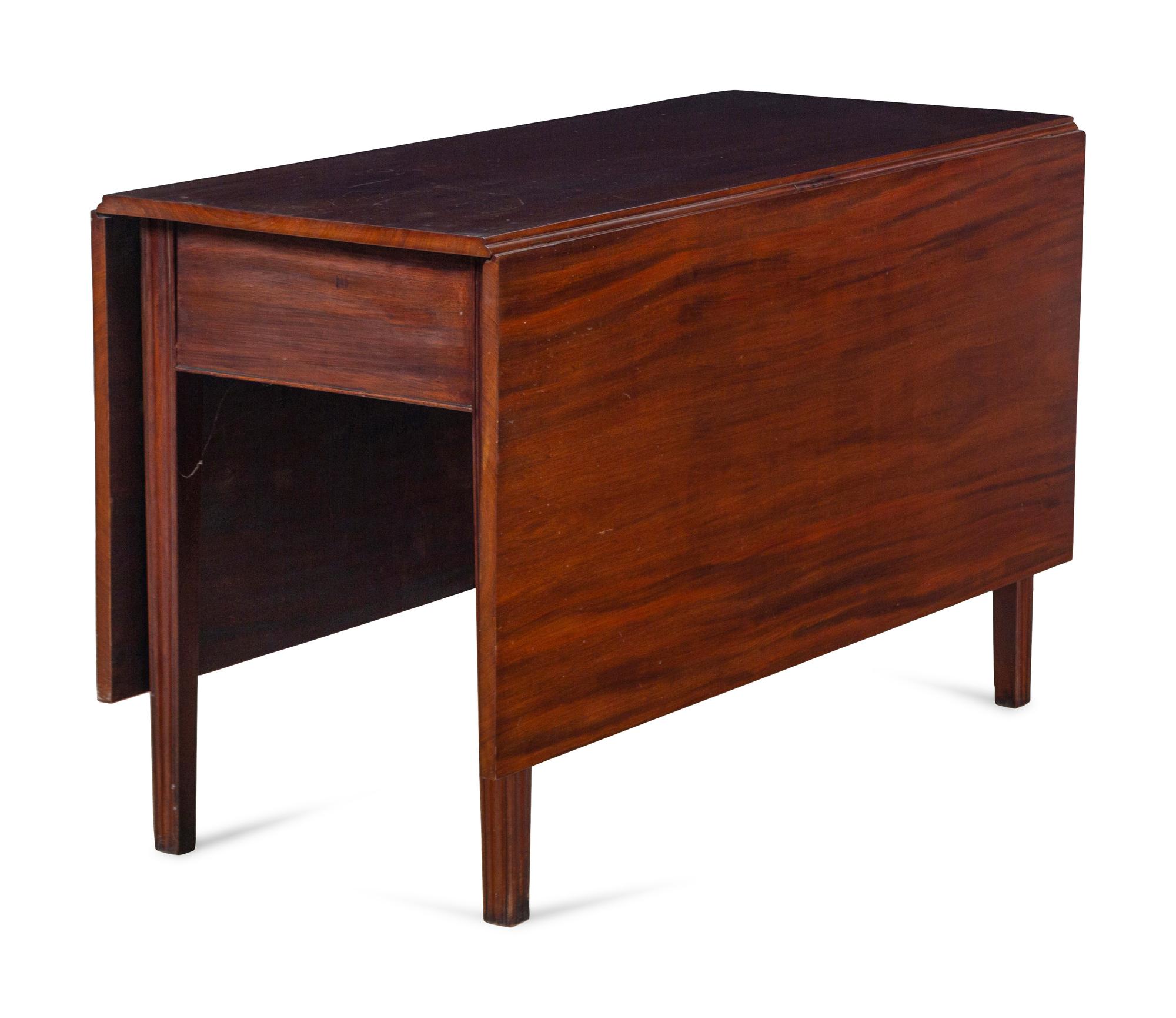 A George III Figured and Channel-Molded Mahogany Drop-Leaf Dining Table