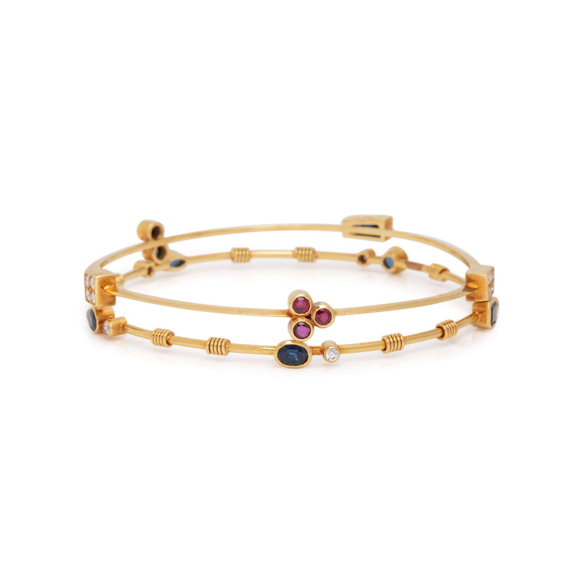 COLLECTION OF YELLOW GOLD, DIAMOND AND GEMSTONE BANGLE BRACELETS