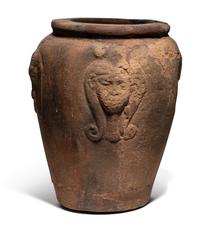 An Egyptian Pottery Jar with Head of Hathor