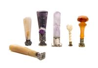 A Collection of Six Seals, Height of tallest 2 7/8 inches.