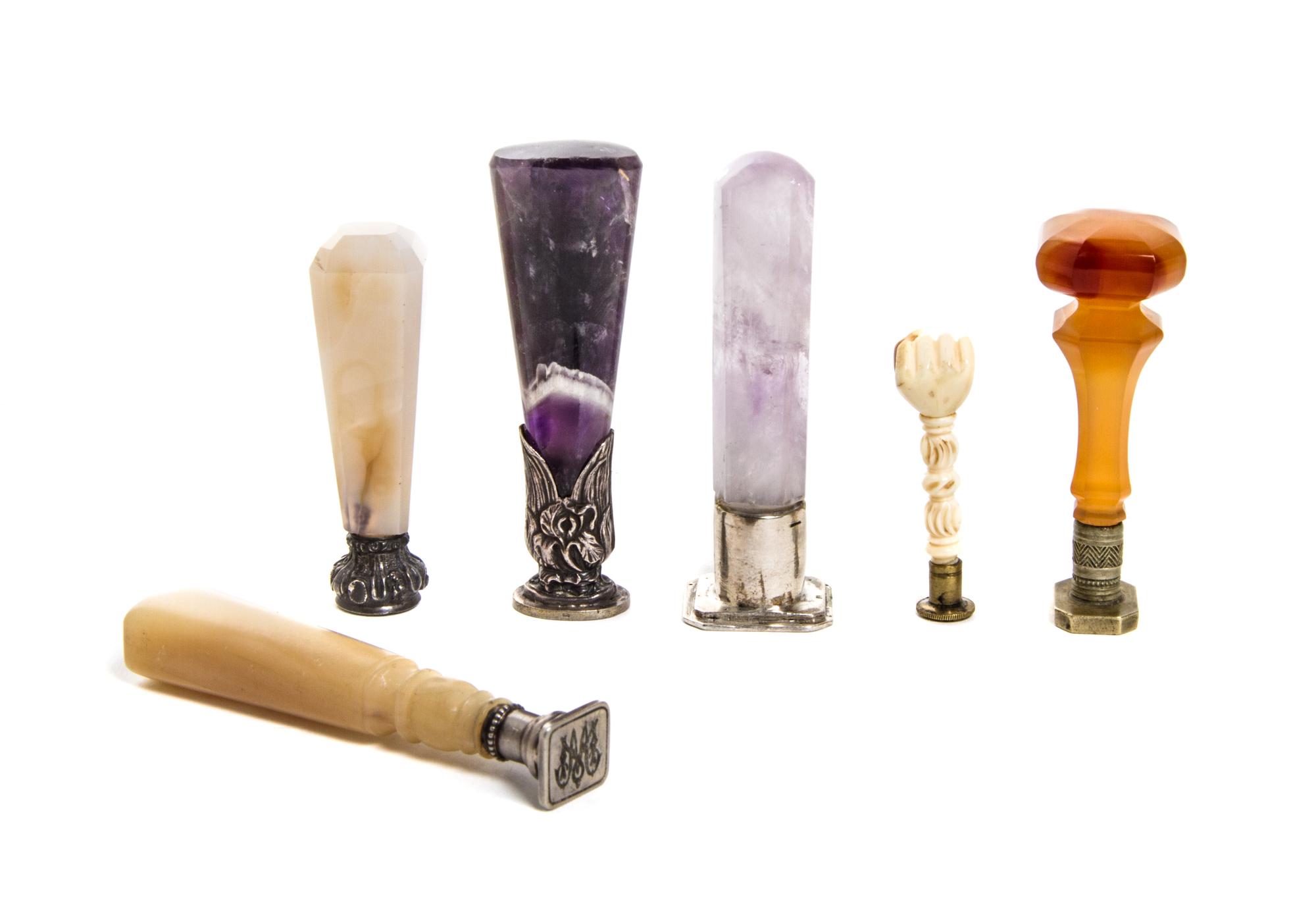 A Collection of Six Seals, Height of tallest 2 7/8 inches.