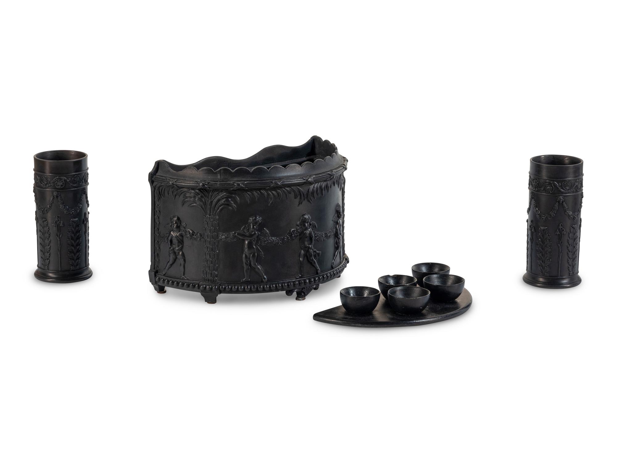 A Wedgwood Basalt Bough Pot and Pair of Spill Vases