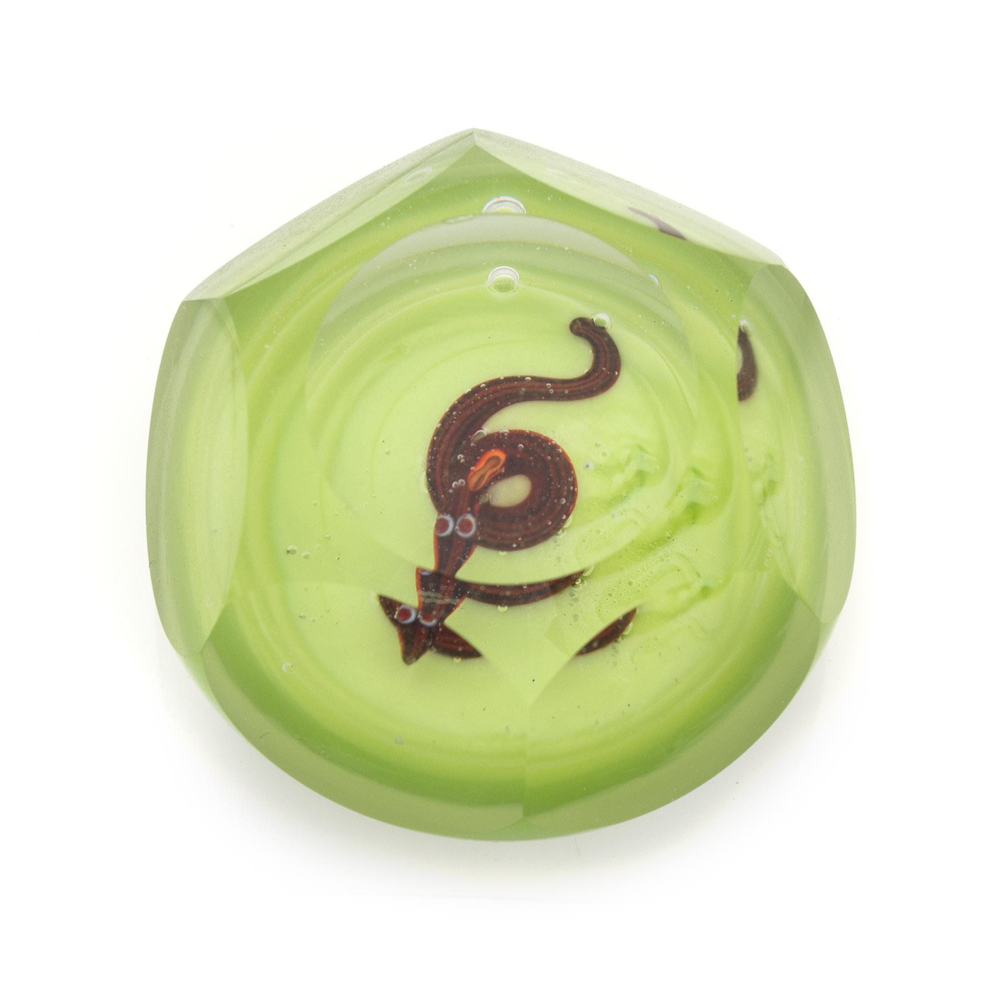 Ronald Hansen, (American), a faceted snake paperweight