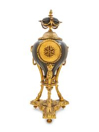 A French Gilt and Patinated Cast Metal Table Clock