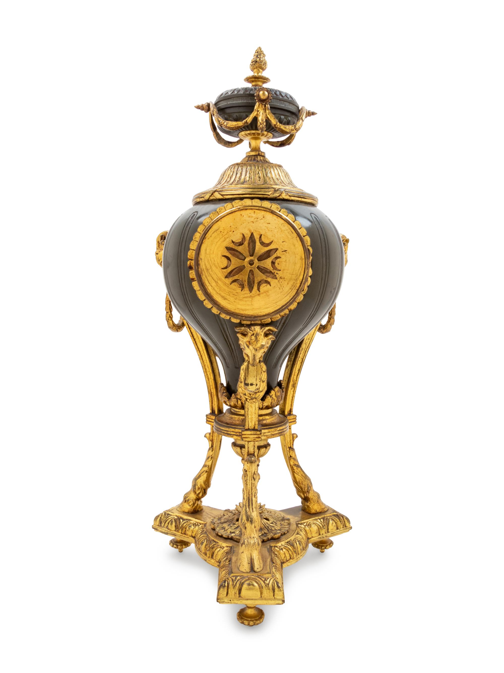 A French Gilt and Patinated Cast Metal Table Clock