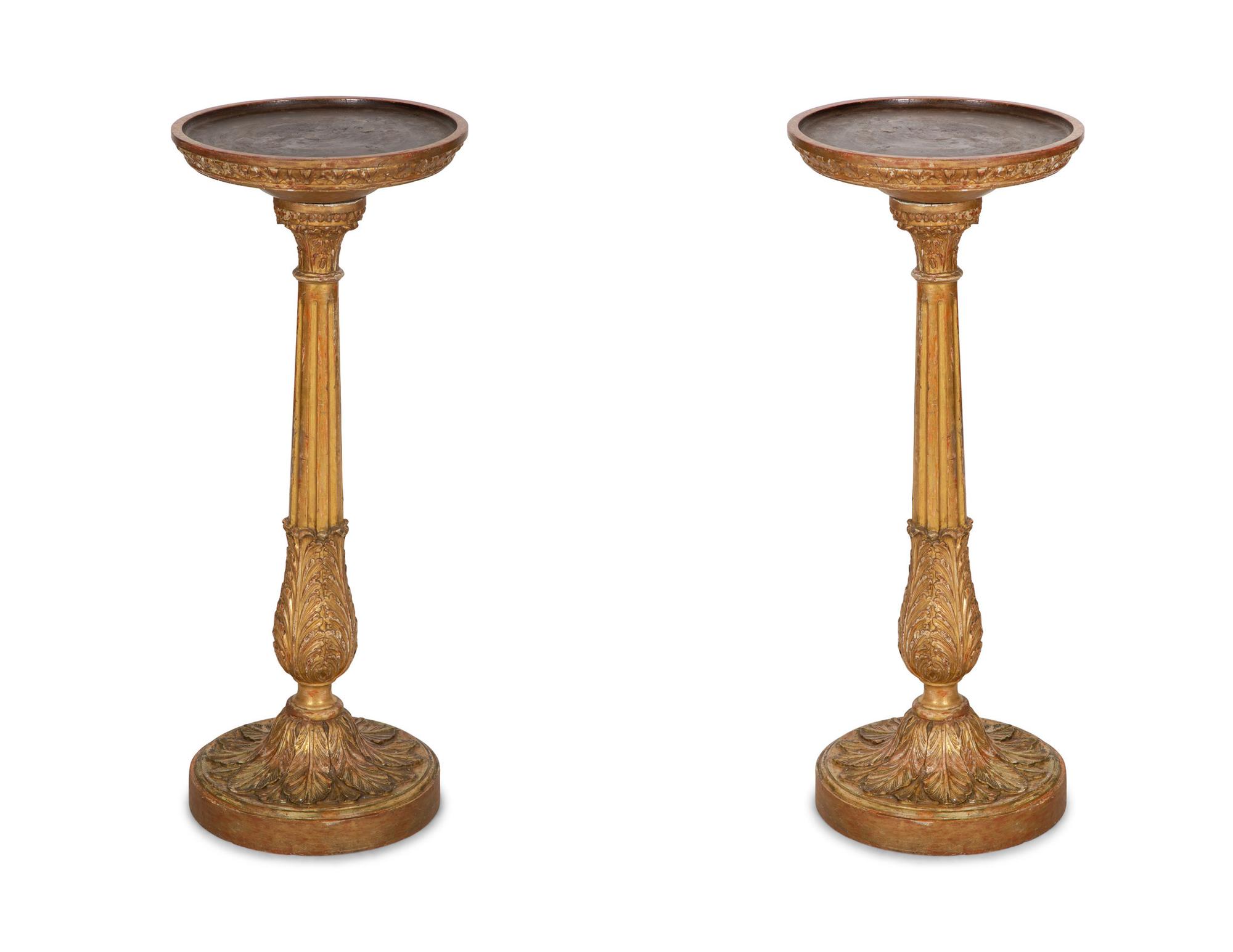 A Pair of Louis XVI Giltwood Pedestals