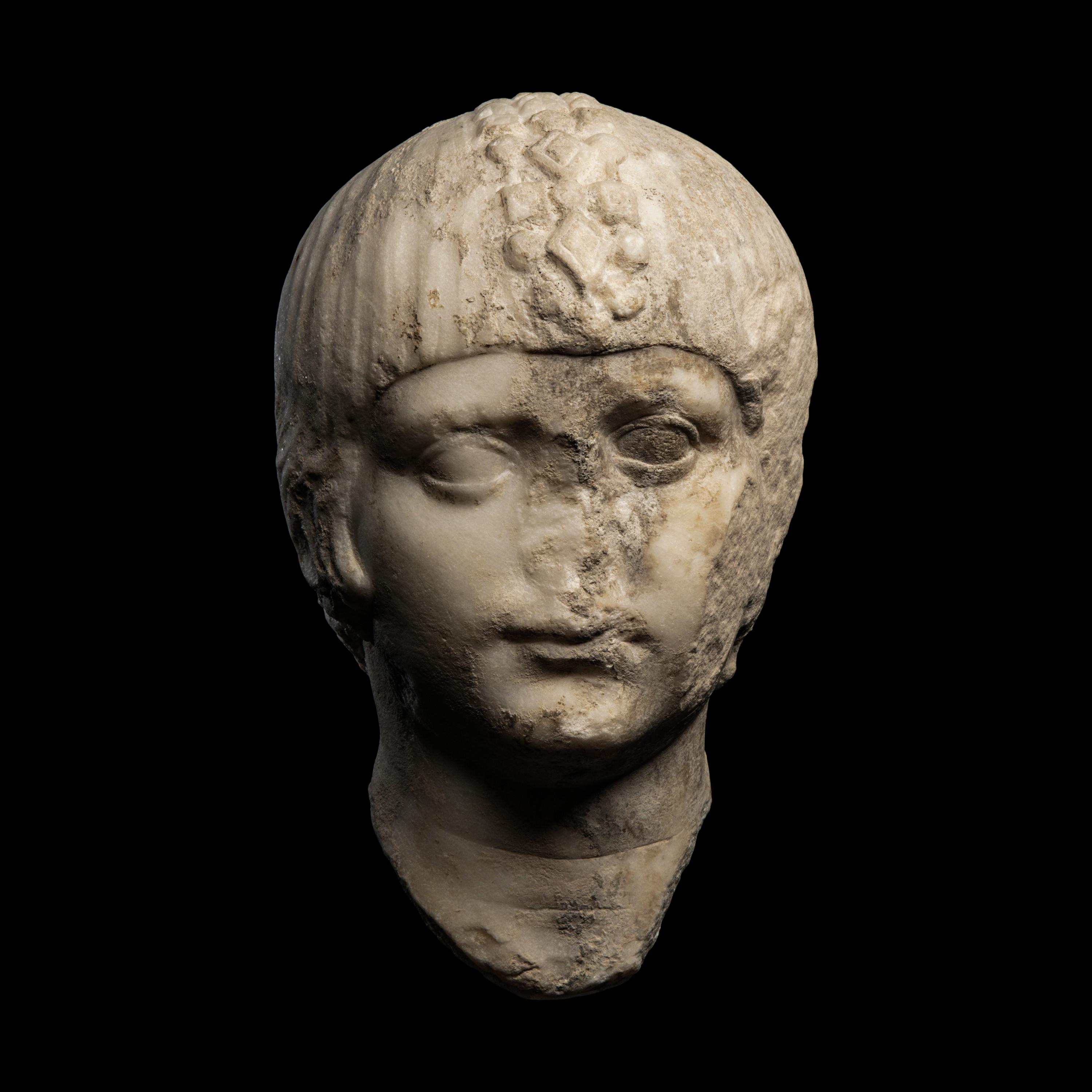 A Roman Marble Portrait Head of a Boy