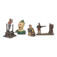 A Group of Four Figural Cast Iron Banks