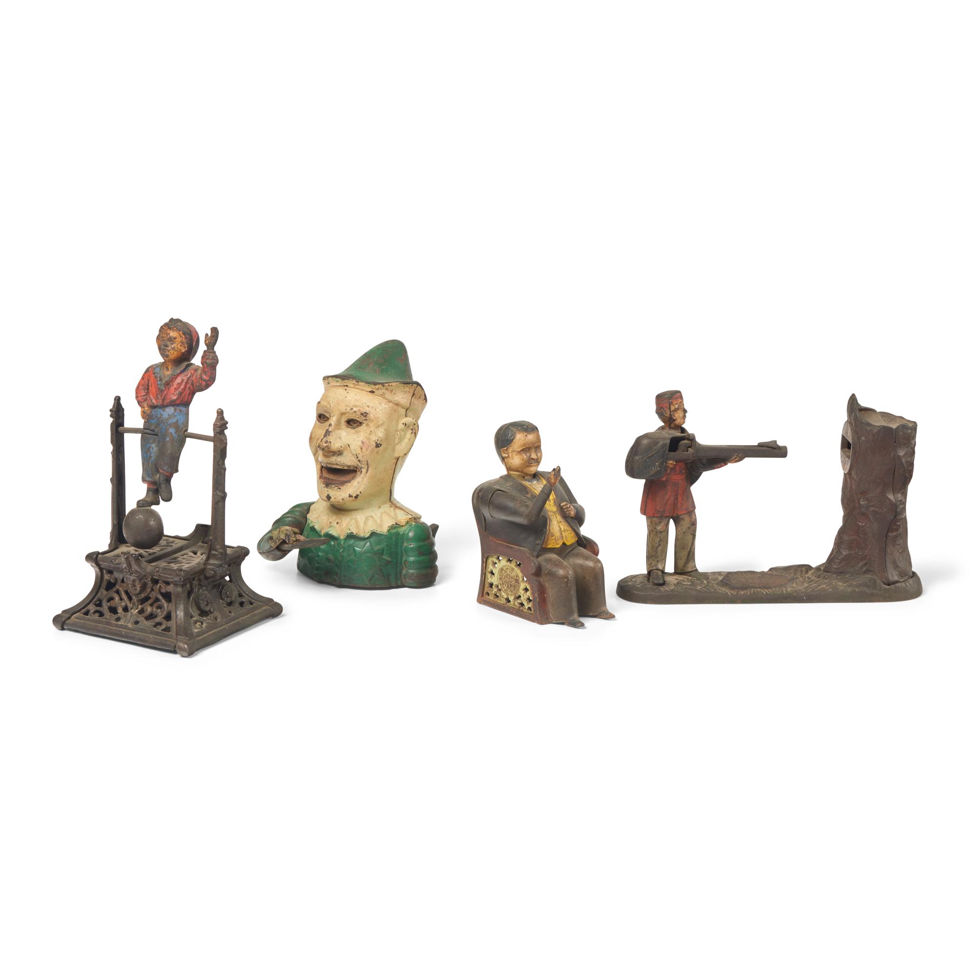 A Group of Four Figural Cast Iron Banks