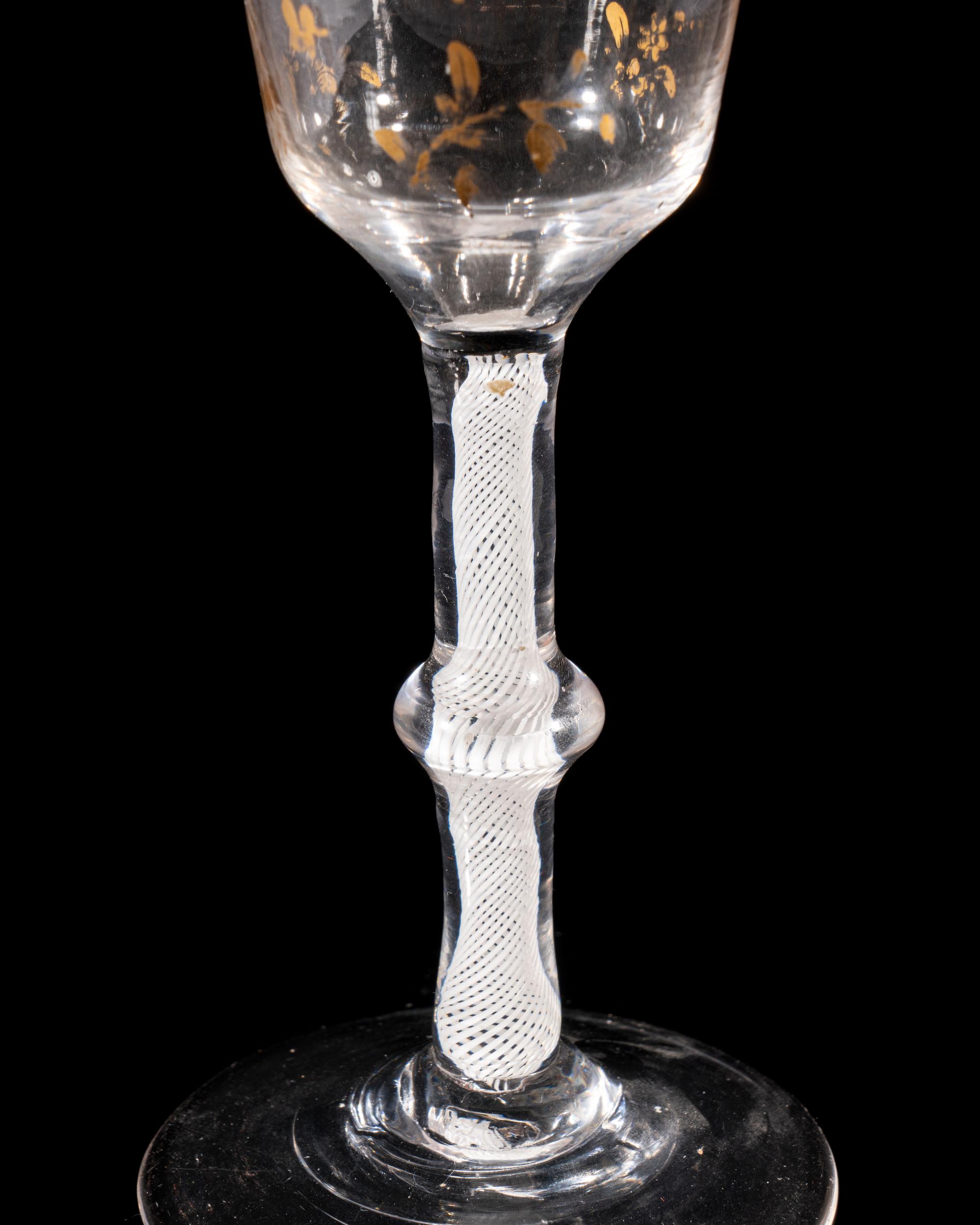 A Giles Gilt Decorated Opaque Twist Knopped Wine Glass