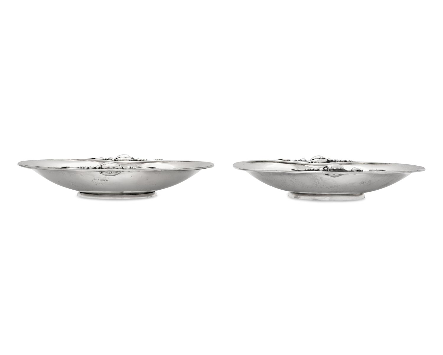A Matched Pair of Georg Jensen Silver Blossom Pattern Dishes