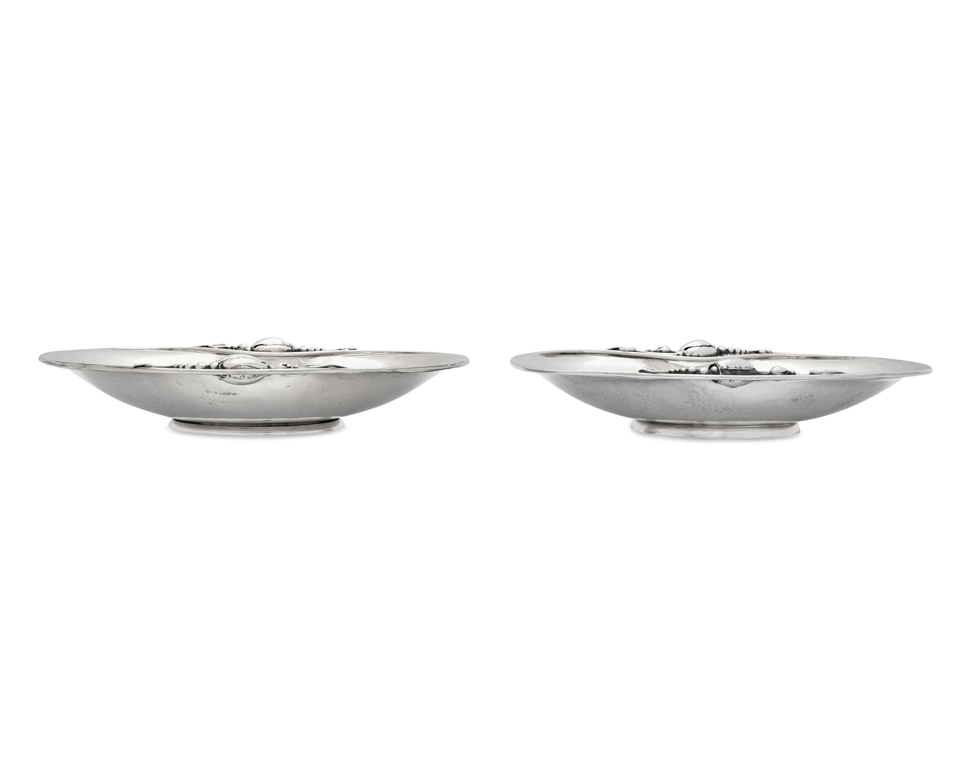A Matched Pair of Georg Jensen Silver Blossom Pattern Dishes