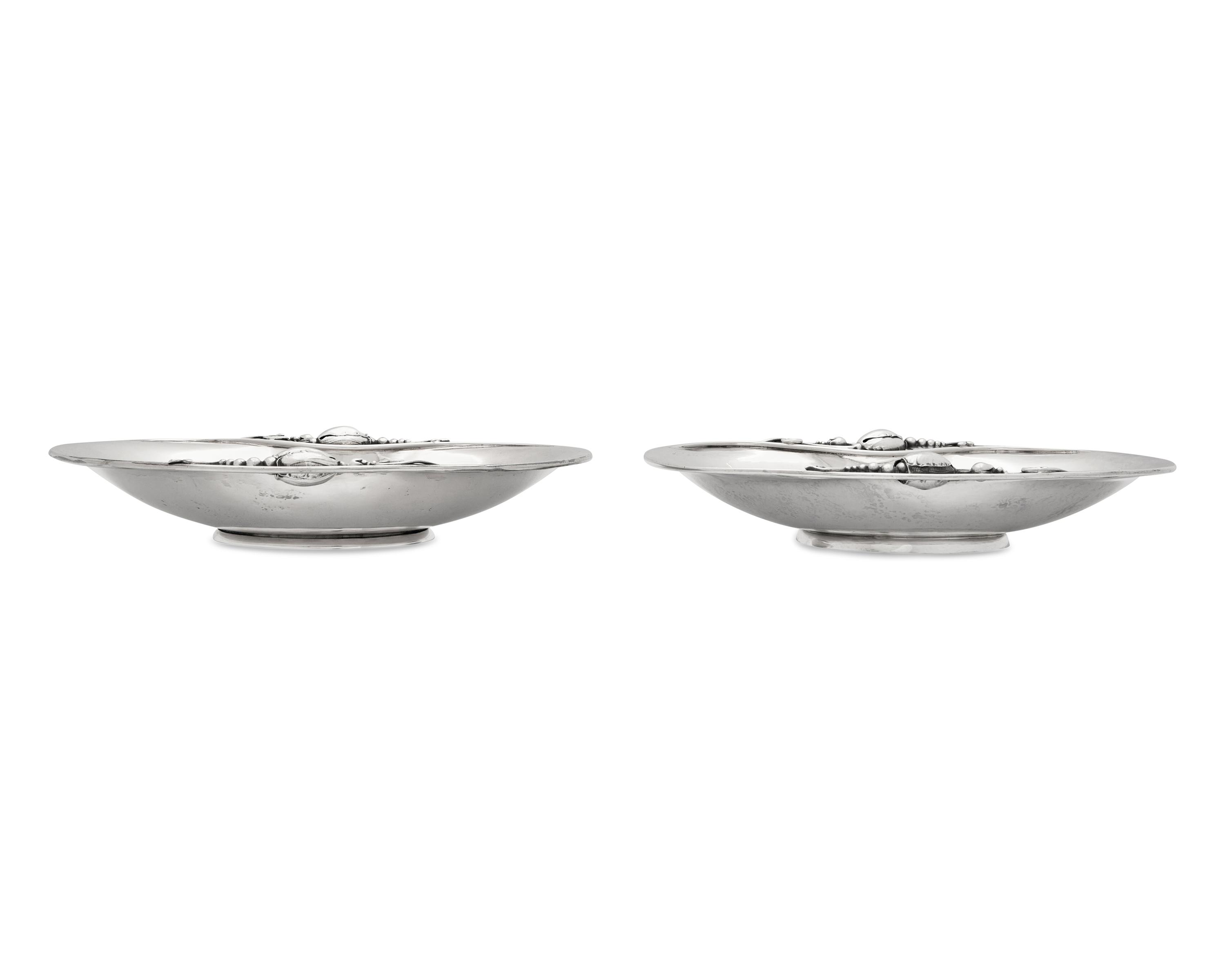 A Matched Pair of Georg Jensen Silver Blossom Pattern Dishes