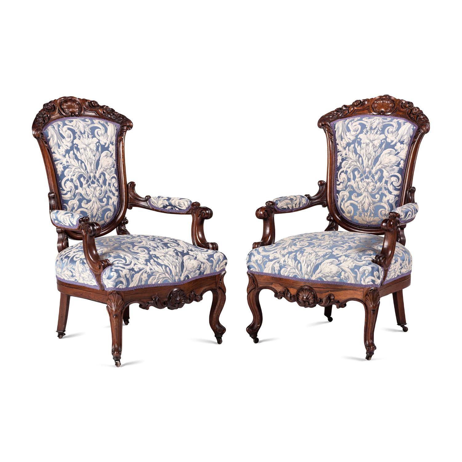 A Pair of Renaissance Revival Carved Walnut Fauteuils