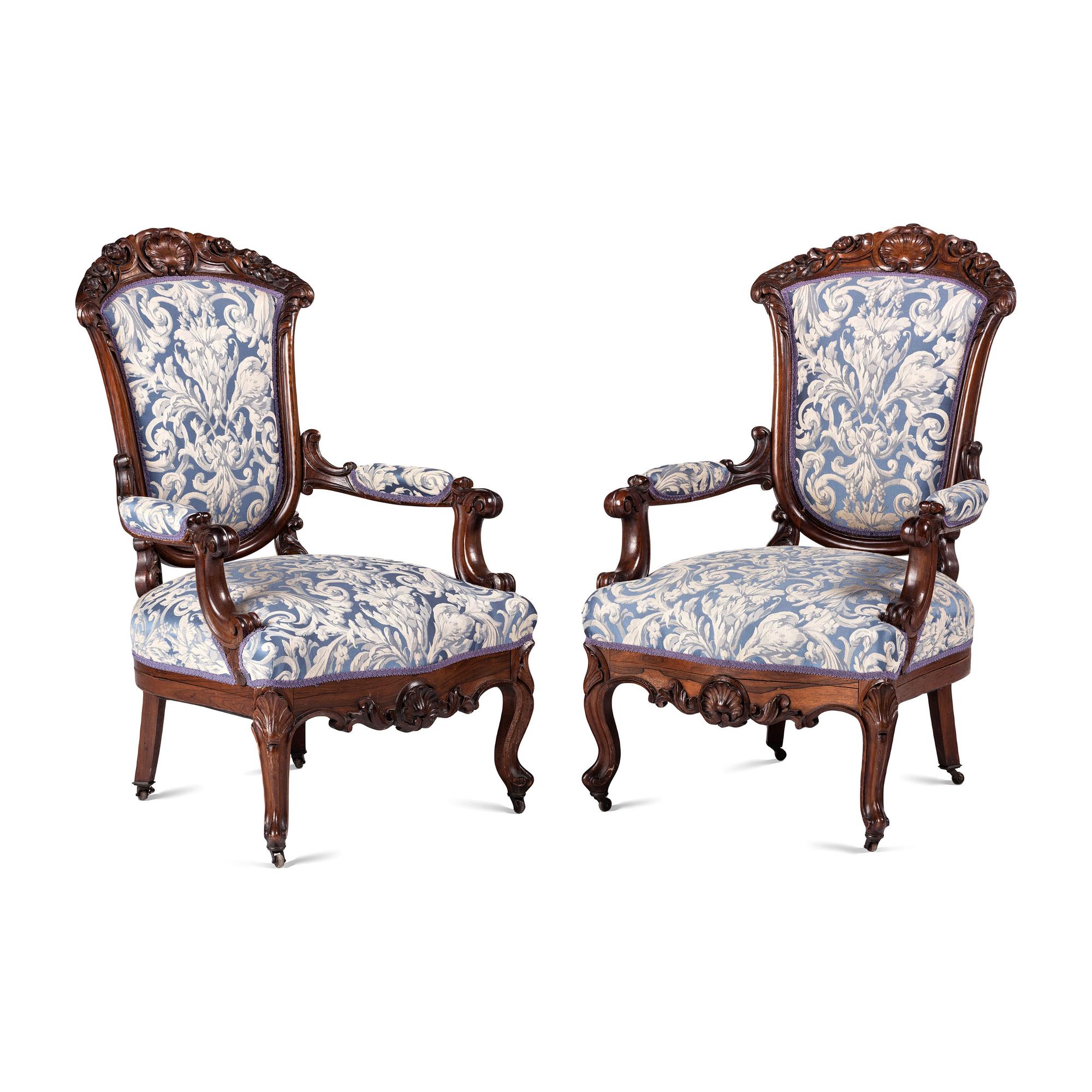 A Pair of Renaissance Revival Carved Walnut Fauteuils