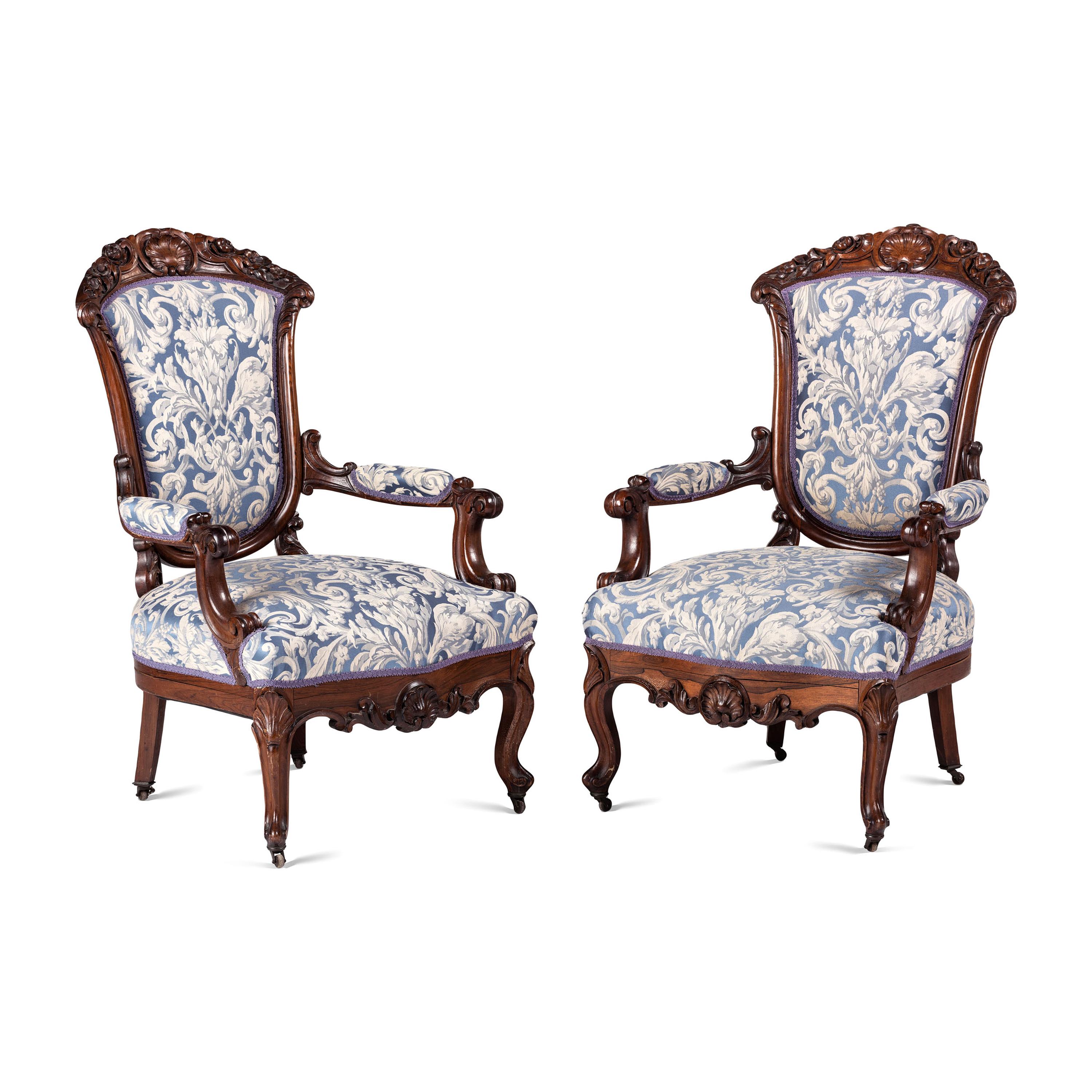 A Pair of Renaissance Revival Carved Walnut Fauteuils