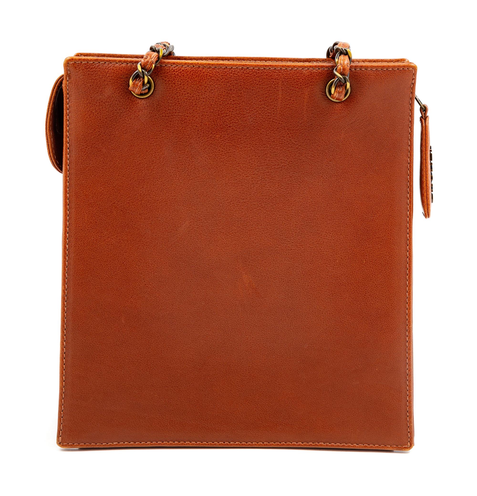 A Chanel Brown Leather Shoulder Bag, 8.5" L x 9.5" W x 3.5" D; Strap drop: 9".