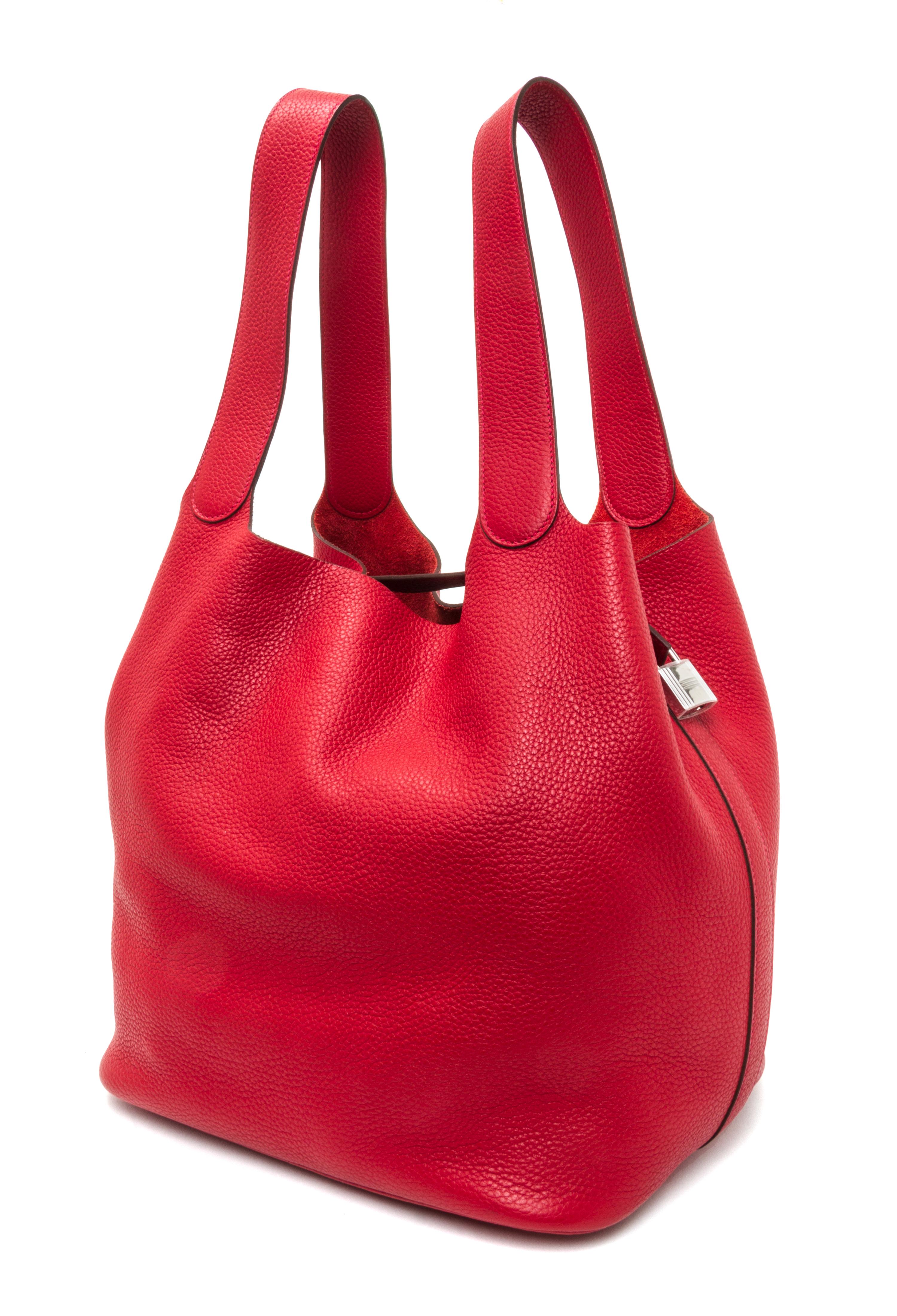 An Hermes Rouge Casaque Taurillon Clemence Picotin Lock TGM Handbag, 13" x 13" x 9".
