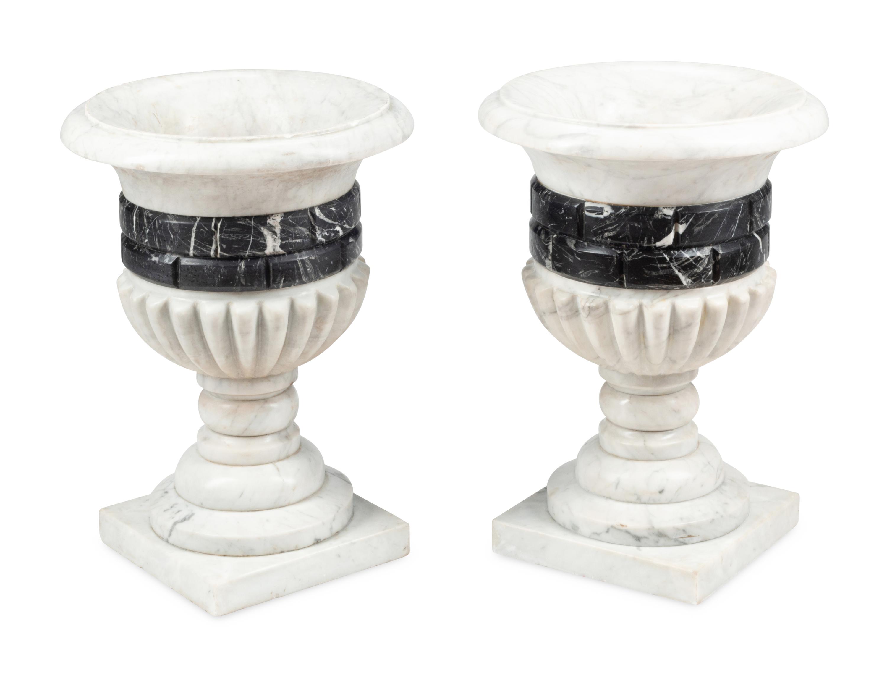 A Pair of Italian Carved Marble Urns