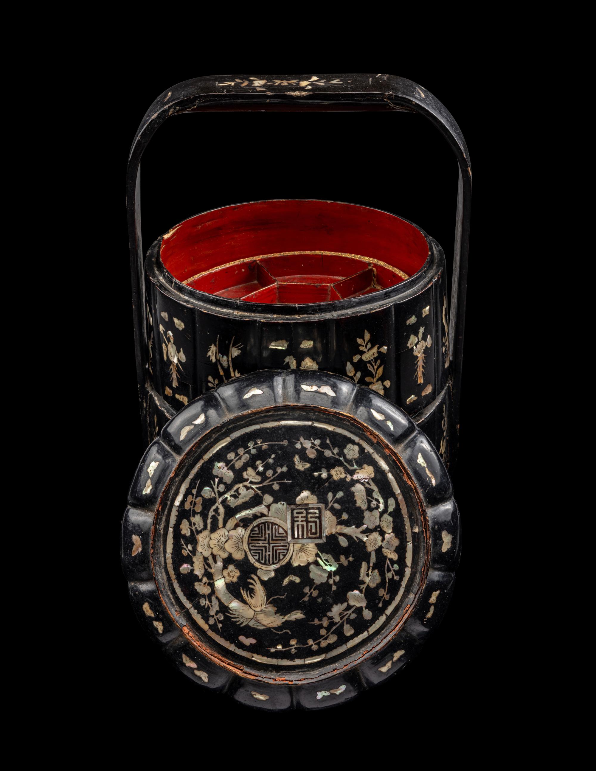 A Chinese Mother-of-Pearl Inlaid Black Lacquer Two-Tier Food Basket, Tihe
