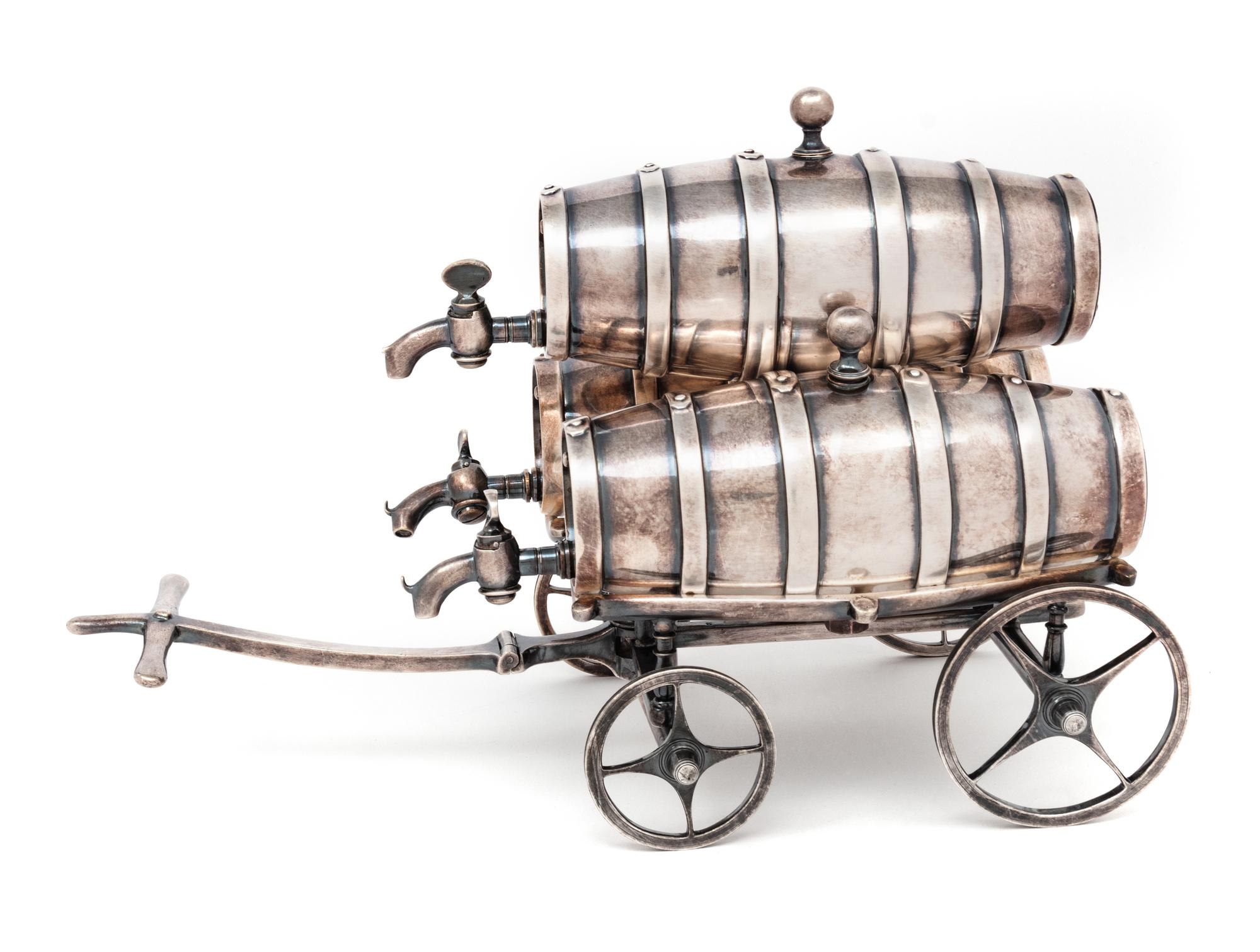 A Victorian Novelty Silver-Plate Triple Spirit Barrel Trolley