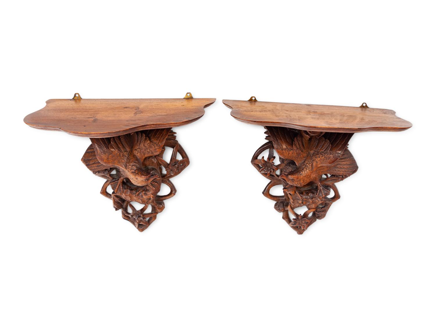 A Pair of Black Forest Style Carved Oak Wall Brackets