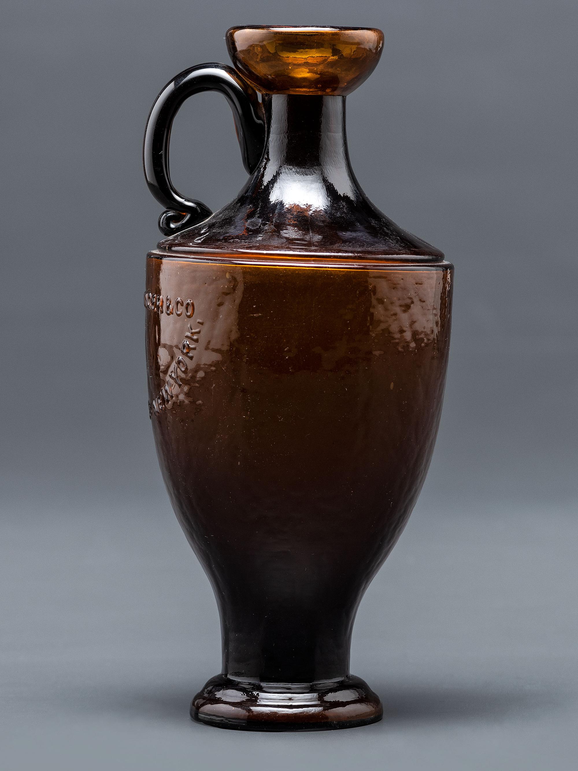 A New York Mold-Blown Amber Bottle