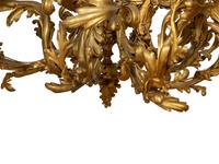 A Gilt Bronze Rococo Style Fourteen-Light Chandelier