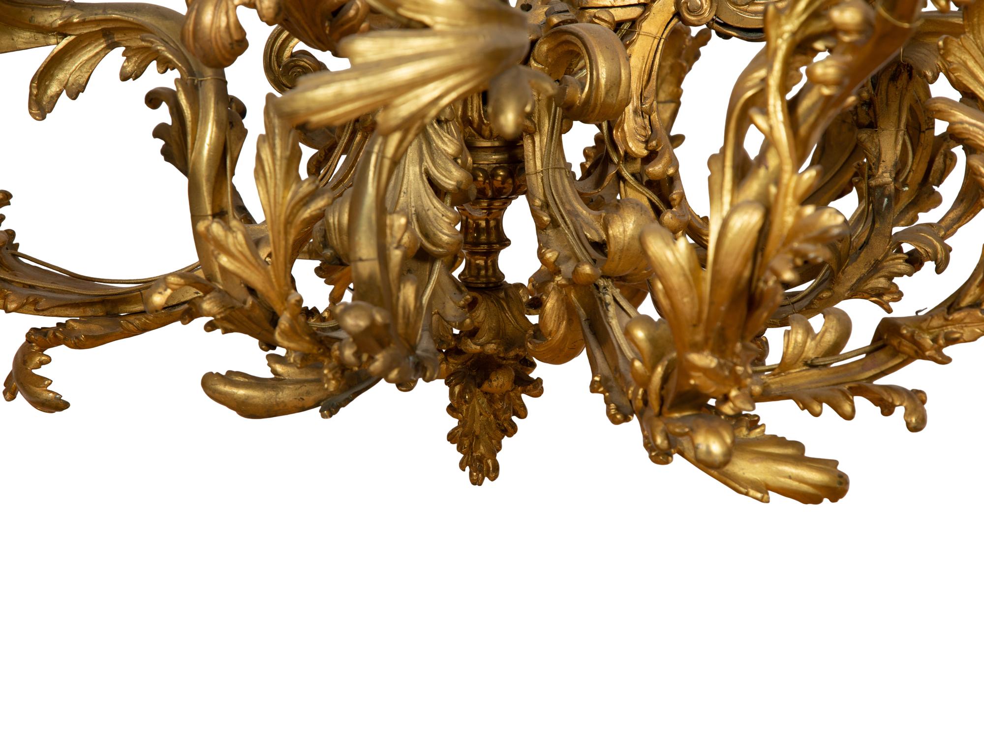 A Gilt Bronze Rococo Style Fourteen-Light Chandelier