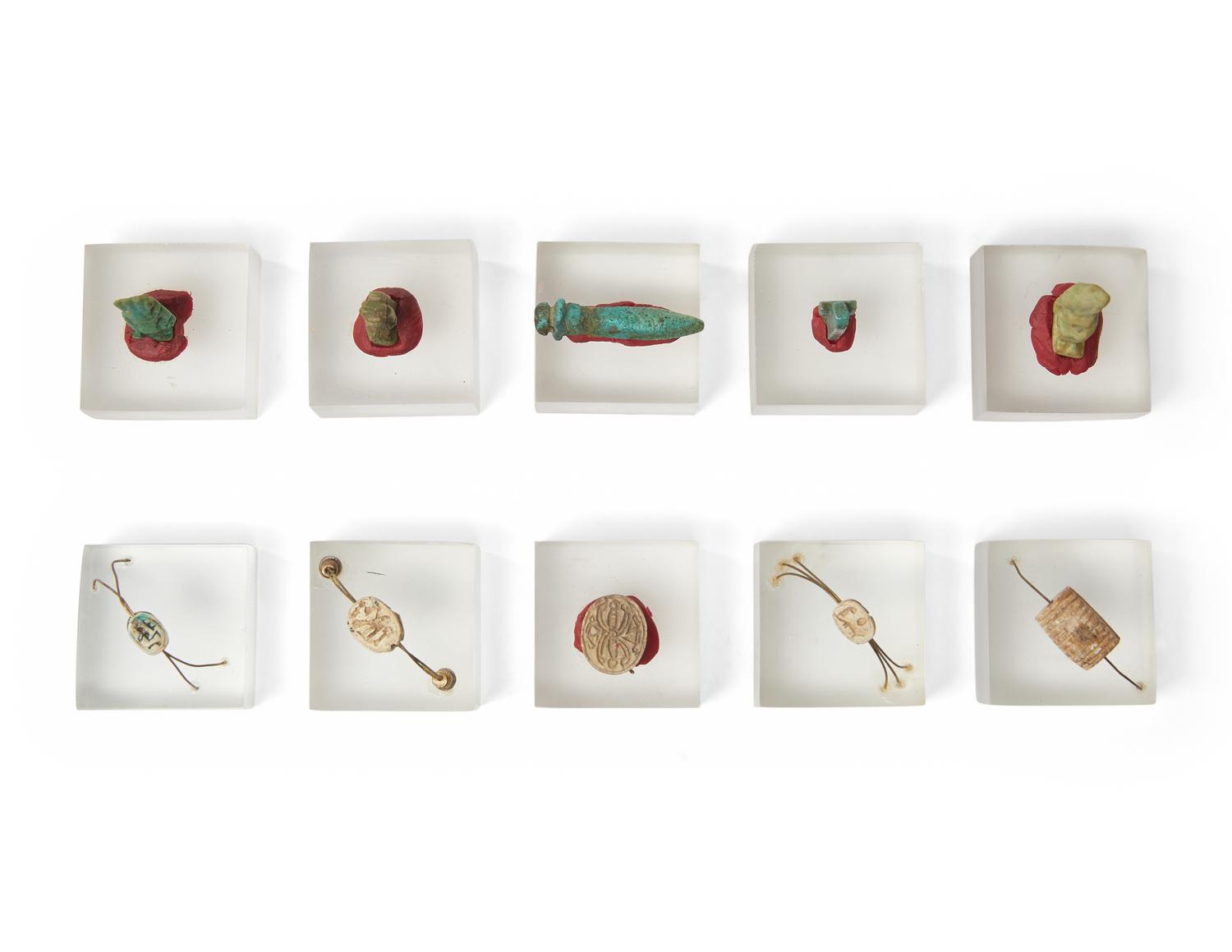 A Group of 10 Egyptian Faience Amulets and Scarabs