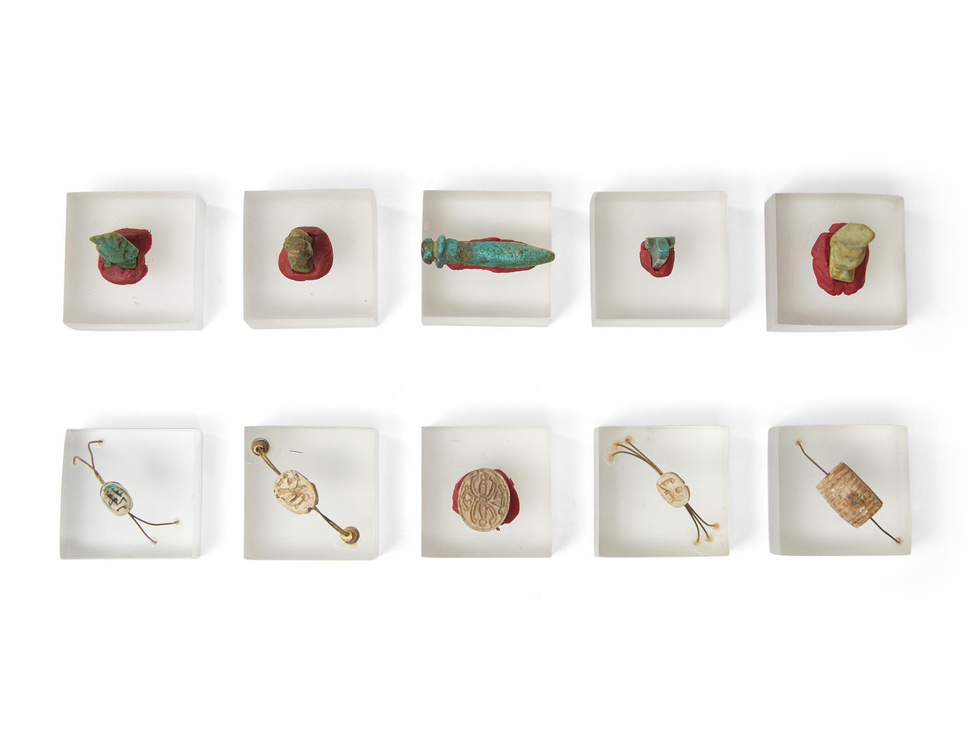 A Group of 10 Egyptian Faience Amulets and Scarabs