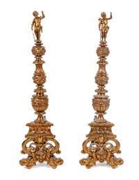A Pair of Continental Gilt Bronze Andirons Height 47 inches.