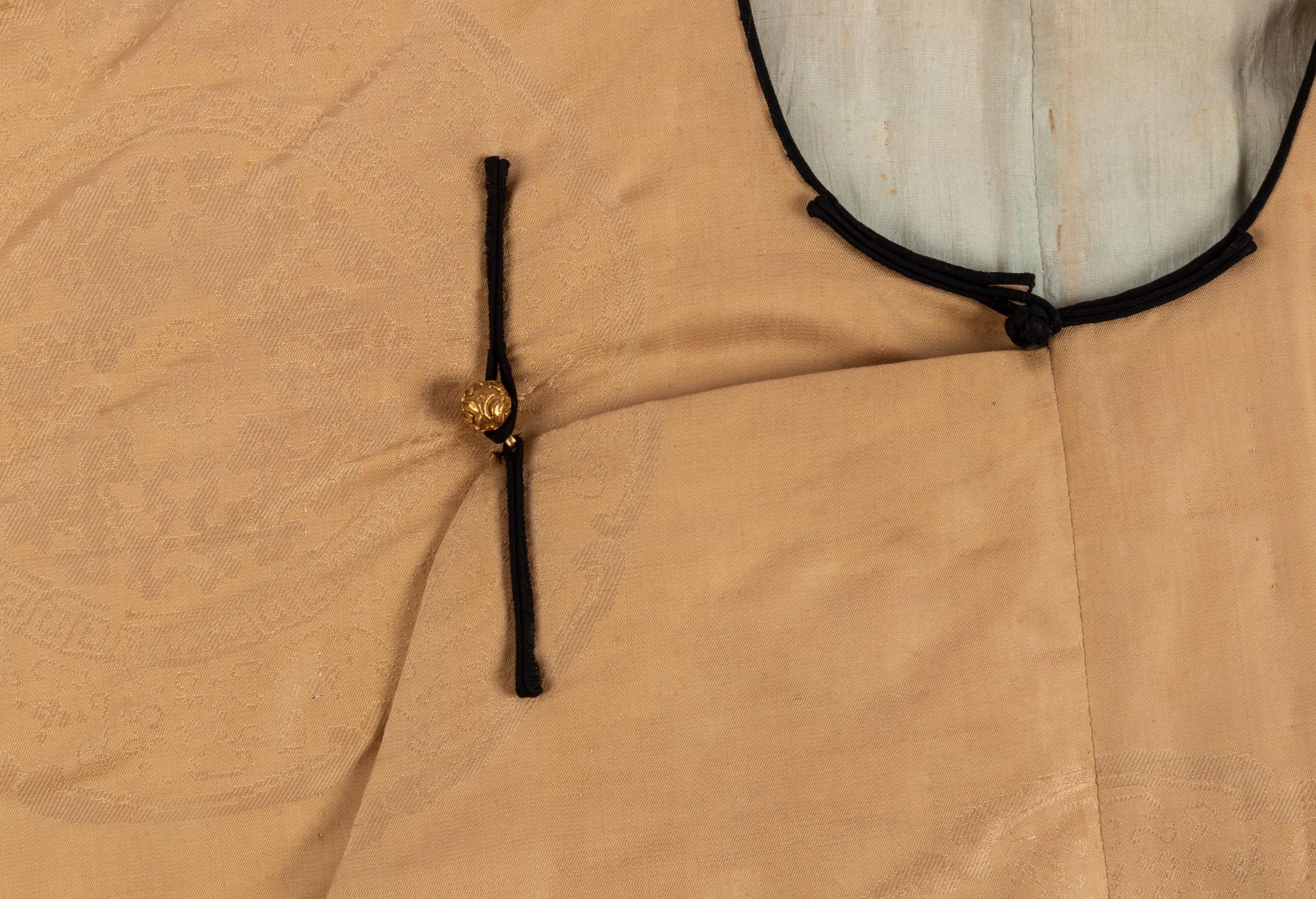 A Pale Yellow Silk and Cotton Padded Winter Robe