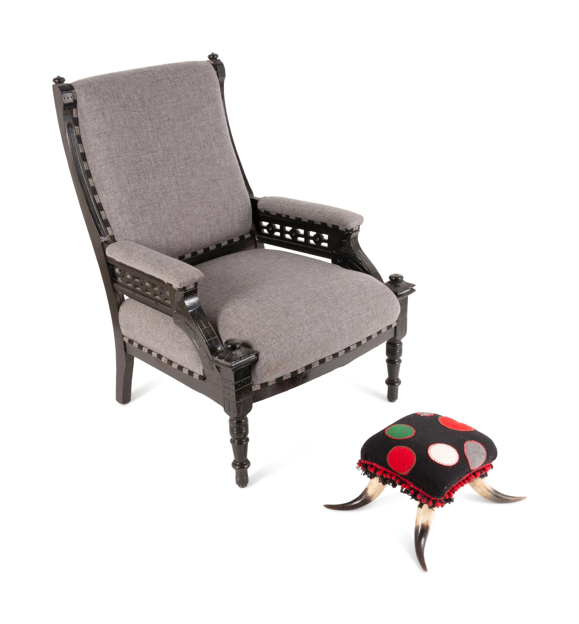 A Victorian Black Painted Armchair and Cow-Horn Footrest