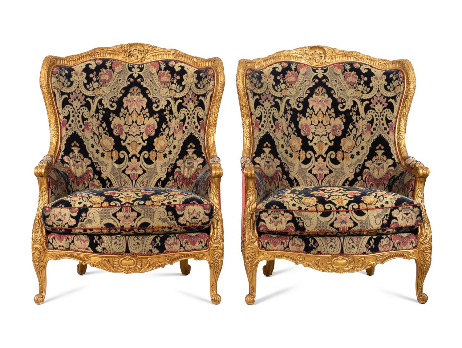 A Pair of Large E.J. Victor Régence Style Giltwood Bergères
