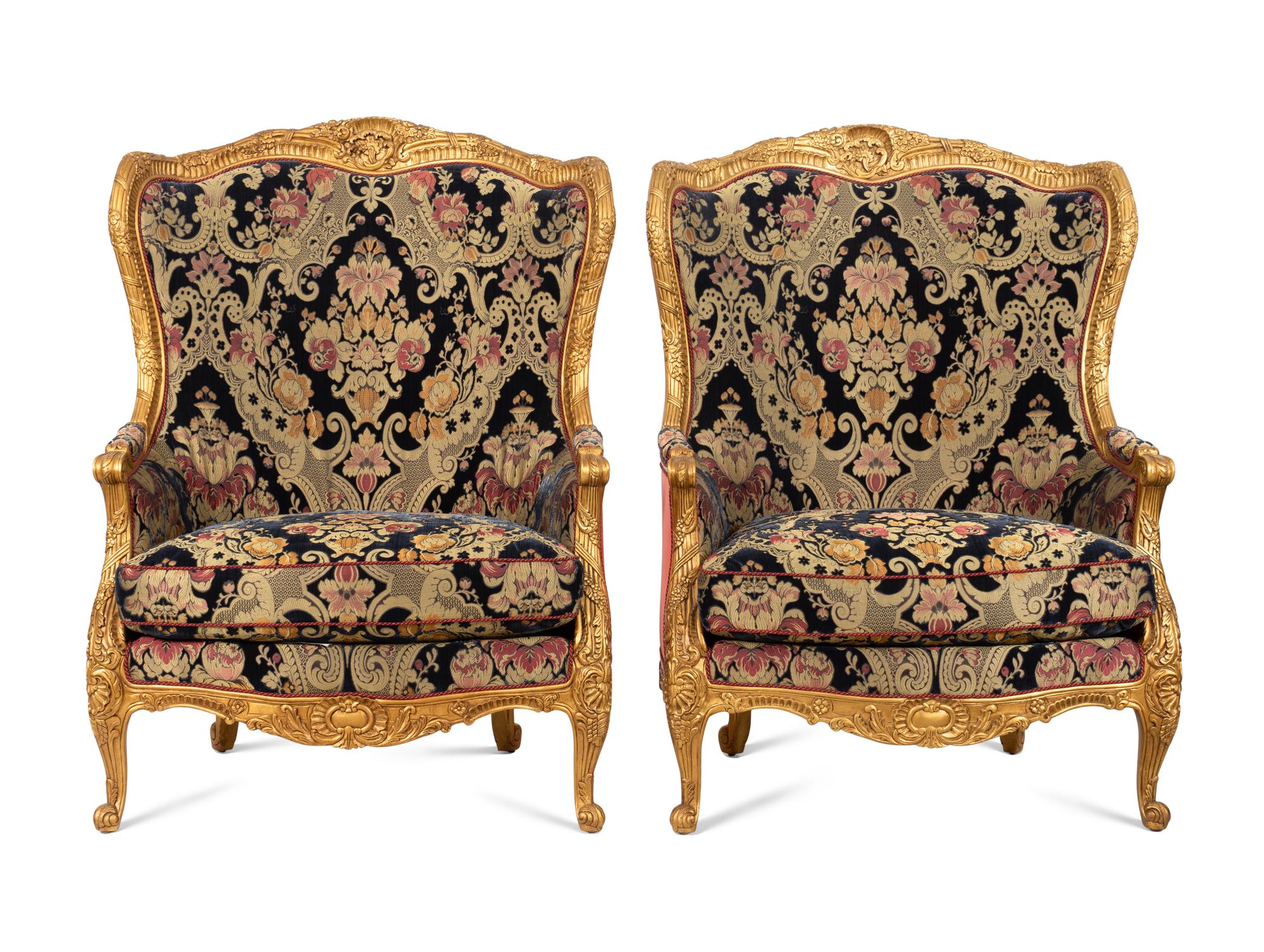 A Pair of Large E.J. Victor Régence Style Giltwood Bergères