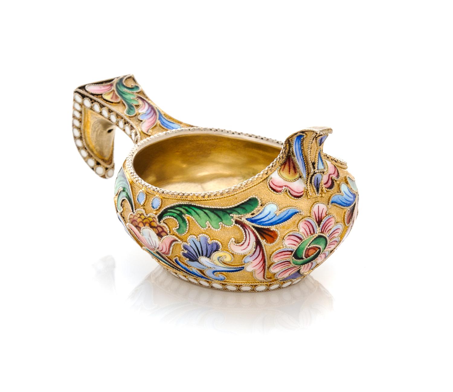 A Russian Silver-Gilt and Enamel Kovsh, Mark of Mikhail Sokolov, Moscow, Late 19th Century, the body and handle decorated with polychro