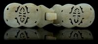 A Carved Jade Belt Buckle Length 5 1/8 inches.