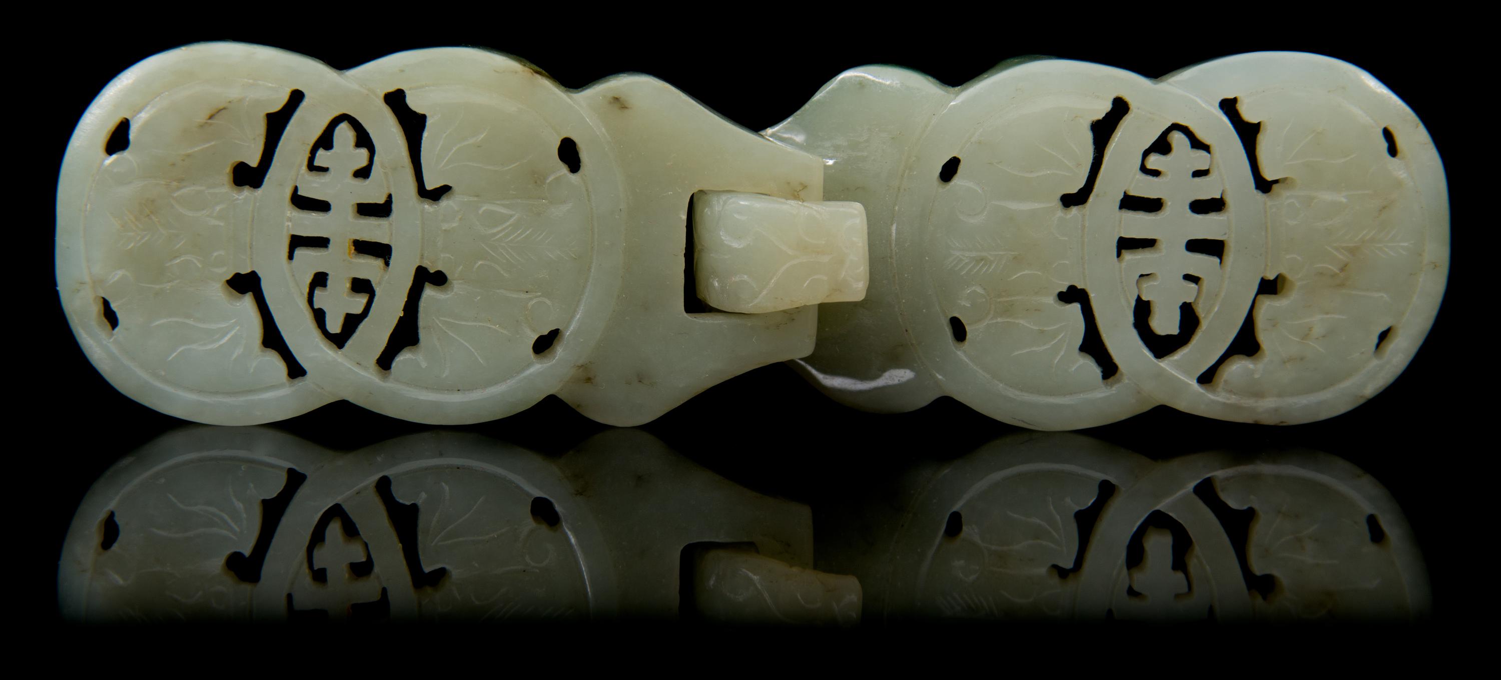 A Carved Jade Belt Buckle Length 5 1/8 inches.